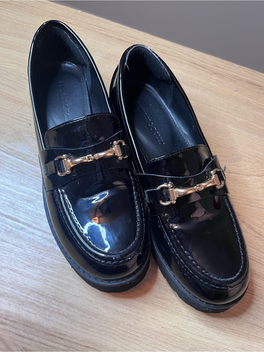 Princess Polly Black Patent Loafers with Gold Horsebit